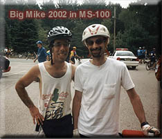 Mike with a cyclist that looks like someone he knows
