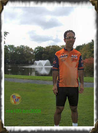 Bike mike posing in front of a water fountain