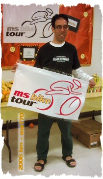 Mike showing off by holding the MS banner