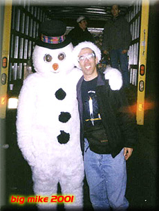Big Mike with a snowman character at Mike Chieffo's.