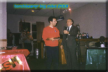 Vinnie Frantantoni present Mike with a award.